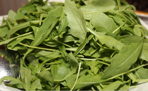 Mixed salad including rocket leaves could be the source