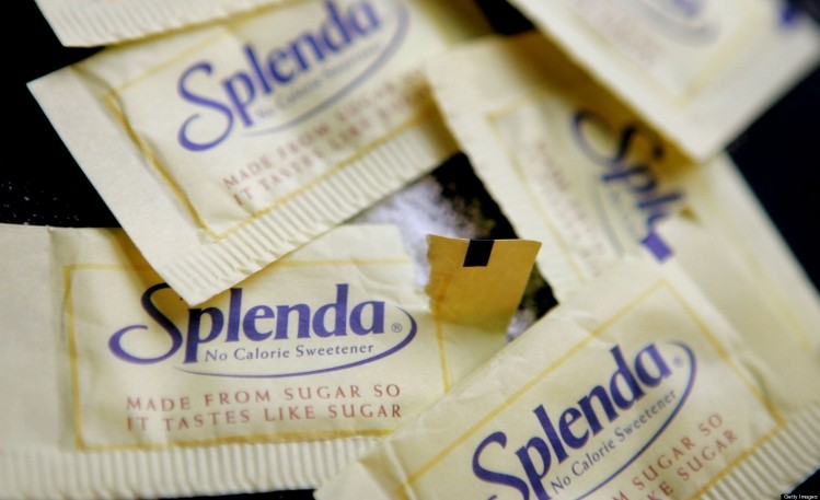 A fall in the price paid for Tate & Lyle's Splenda sweetener has hit the firm's profits 