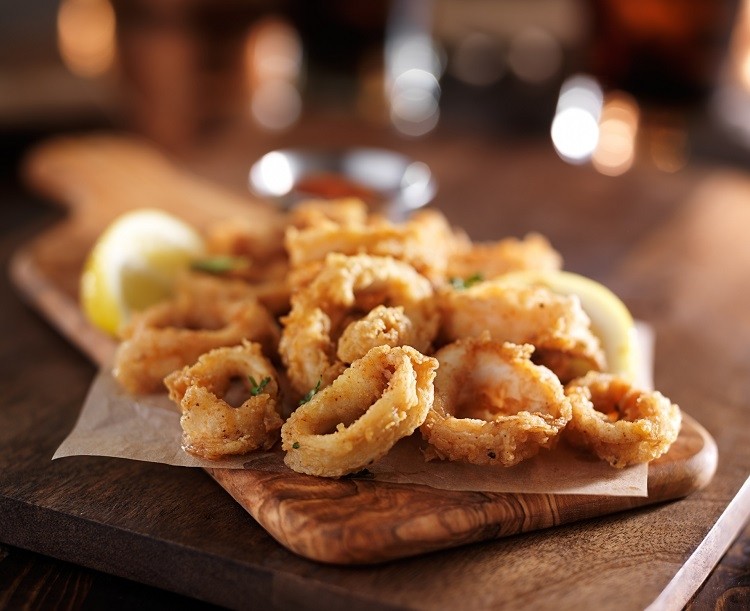 AquaCultured Foods is making whole cut pieces of seafood from microbes, including calamari. GettyImages/rez-art