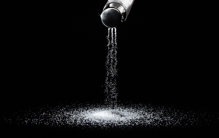 A diet too high in salt raises blood pressure and increases health risks. GettyImages/Andrei Berezovskii