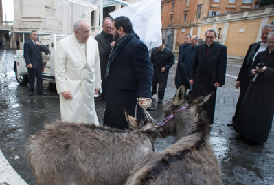 Pope Francis and Eurolactis founder, Pierluigi Orunesu, discussing donkey milk at the Vatican.