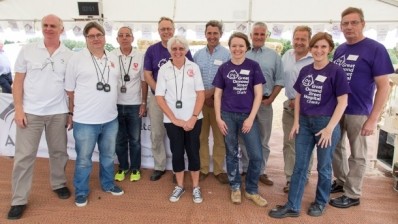 The ADM Milling team with the event's official timekeepers