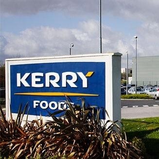 Kerry lowers outlook despite H1 growth