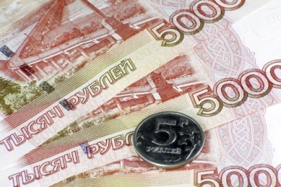 The devaluation of the Russian rouble is expected to push up the price of food and fuel in 2015