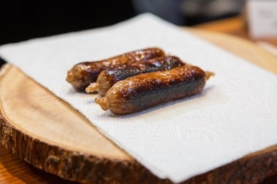 Cultivated meat production provides a more controlled environment than animal agriculture, reducing the need for antibiotics. Image Source: Company name: New Age Meats  Product: Pork sausage, served at a private tasting event in September 2018.   https://www.businessinsider.com/taste-test-lab-grown-meat-sausage-cost-2018-11  Access & Permission: CC BY New Age Meats