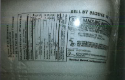 Picture: SFC. Crinkled instructions of a SHI label on curved surface of a turkey breast 