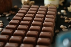 Amid soaring prices, deforestation regulations, and unsustainable practices, chocolate makers may well be tempted to give cocoa alternatives a try. GettyImages/grdenis