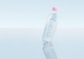 Evian launches new bottle with engraved logo